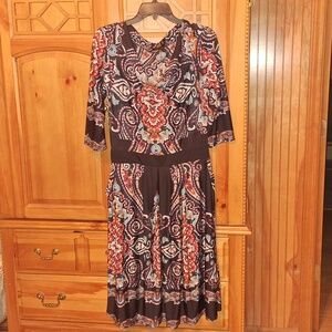 Has pockets! Cute with boots!